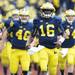 Michigan senior quarterback Denard Robinson leads his team onto the field at Michigan Stadium against Michigan State on Saturday afternoon. Melanie Maxwell I AnnArbor.com